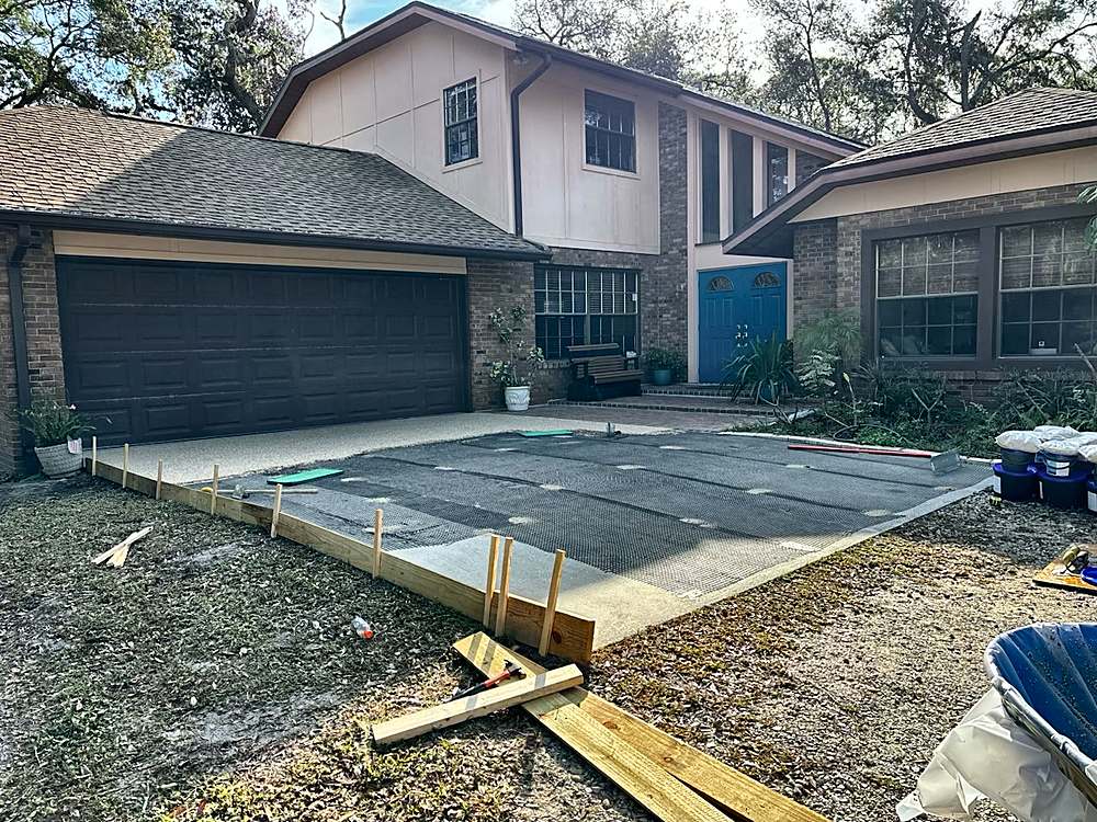 Driveway during installation with forms and mesh