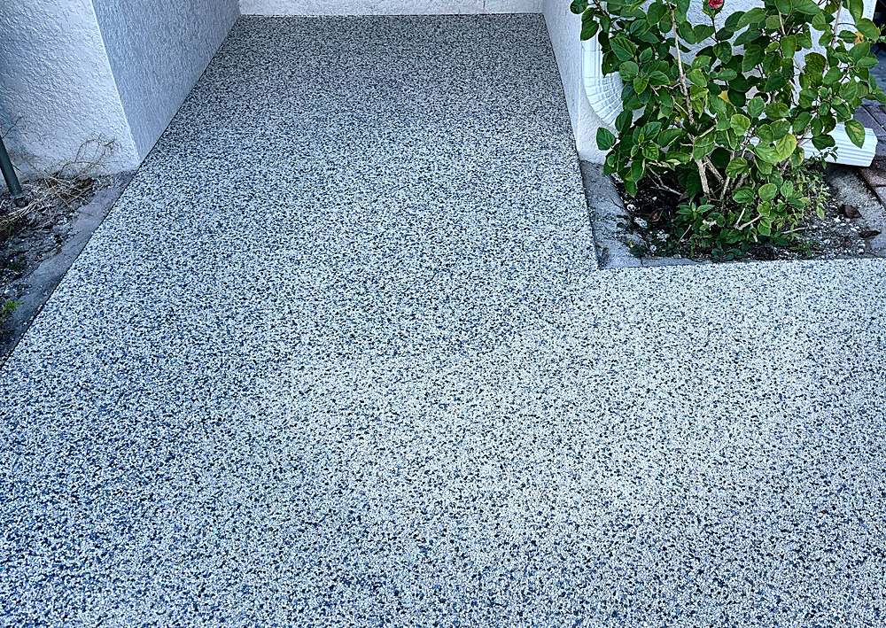 Entry walkway finished in a light gray Vuba Stone blend