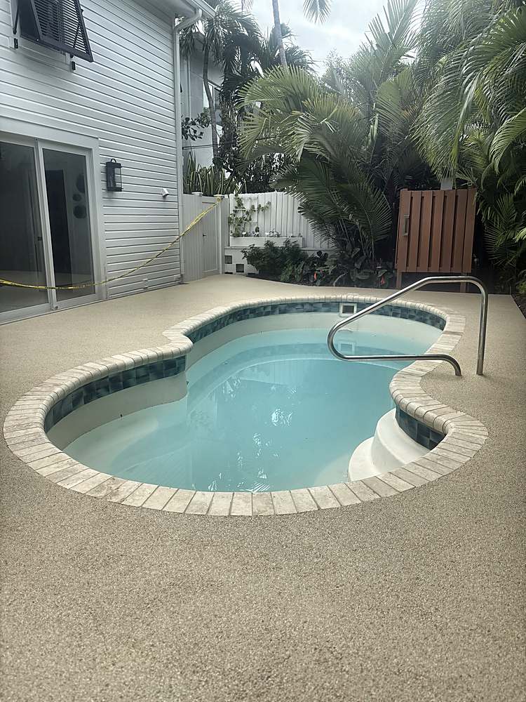 Same pool deck finished in a light Vuba Stone blend