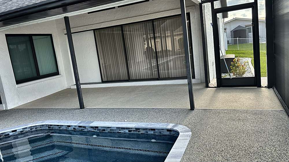 Covered lanai and pool deck finished in Vuba Stone