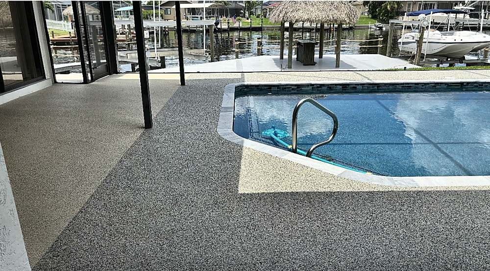 Same waterfront pool deck finished in Vuba Stone